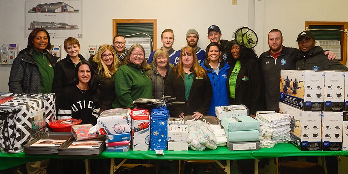 The Utica Comets, the Utica City Football Club, and Wolfspeed delivered home goods to a non-profit that provides housing for families in Utica.