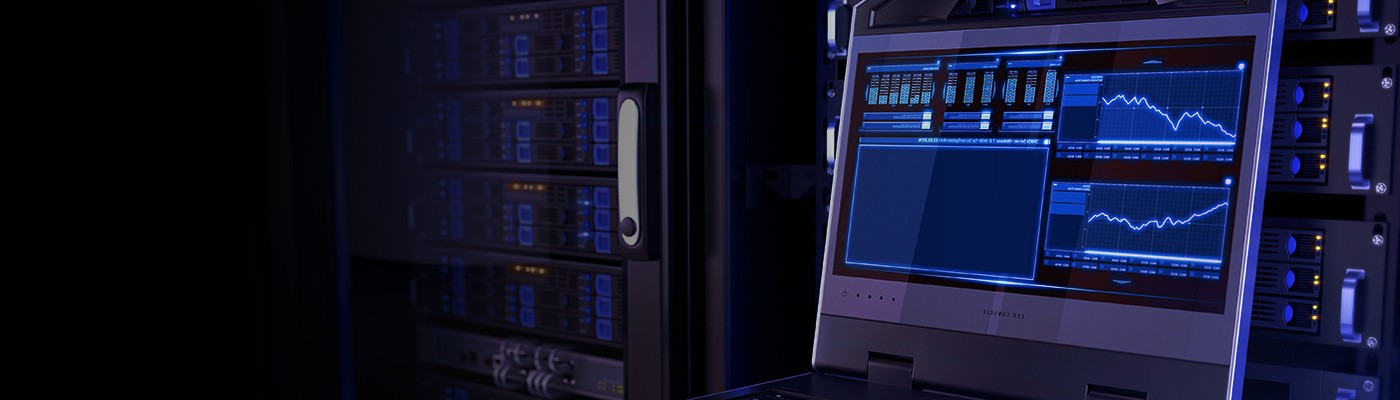 An open laptop sits beside server stacks representing how Wolfspeed's Silicon Carbide power products deliver more computing power and thermal performance.