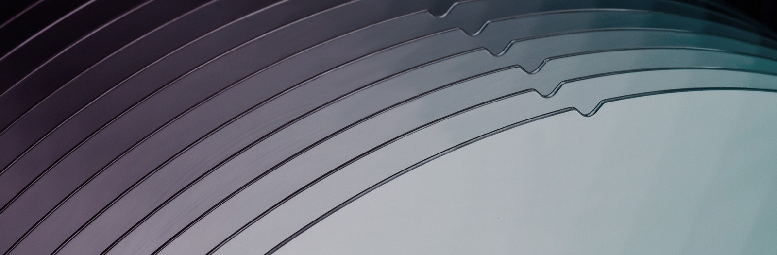 Multiple Wolfspeed Silicon Carbide 200mm wafers grouped together.