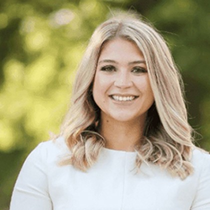 A professional headshot taken of our 2019 HR intern named Anna.