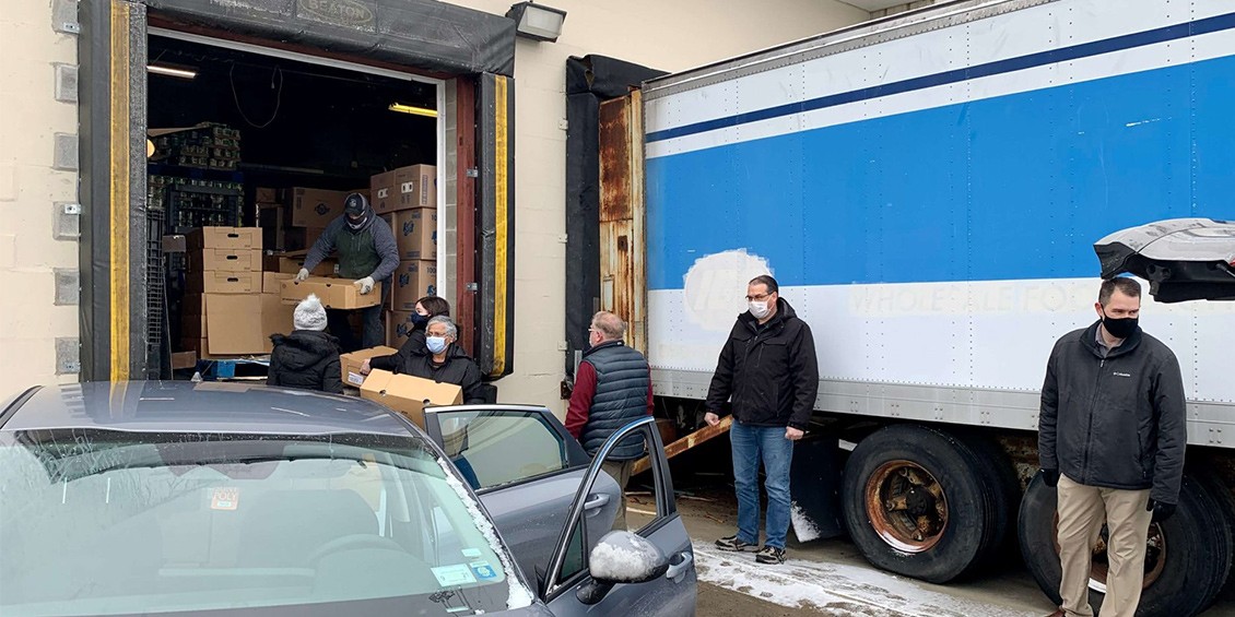 The Wolfspeed Mohawk Valley Team loads up 200 turkeys to be donated to the Utica City Rescue Mission, a charity in New York.